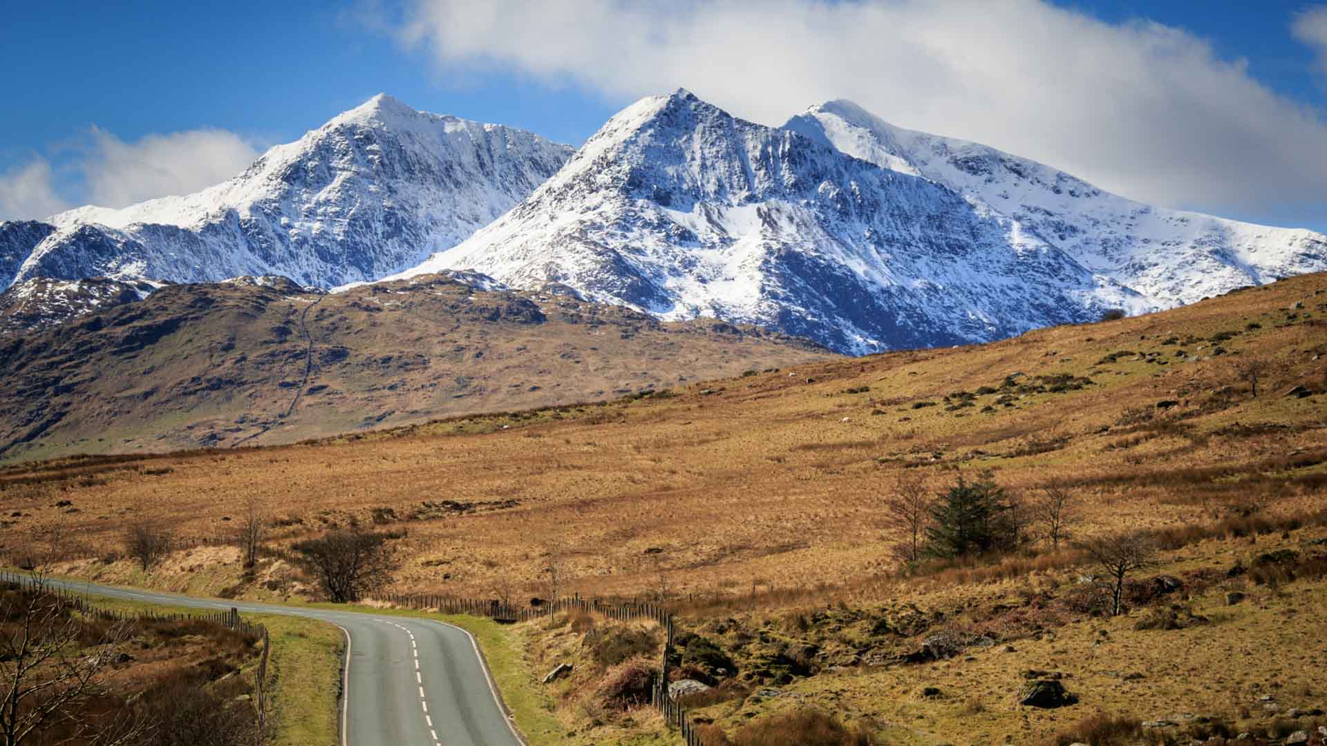 Road cycling through Aberglaslyn Pass towards Beddgelert