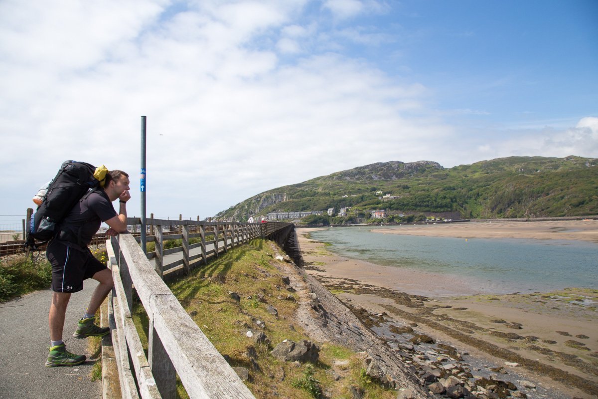 Walkers on a trail along the Mawddach estuary