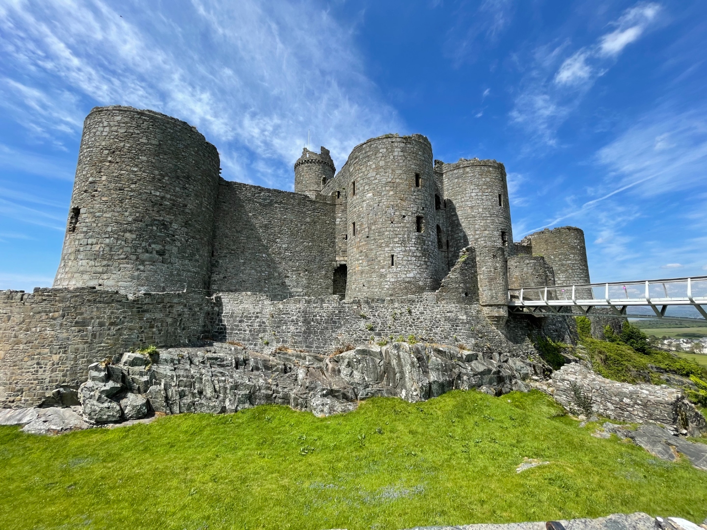 Harlech Castle towers against a blue sky