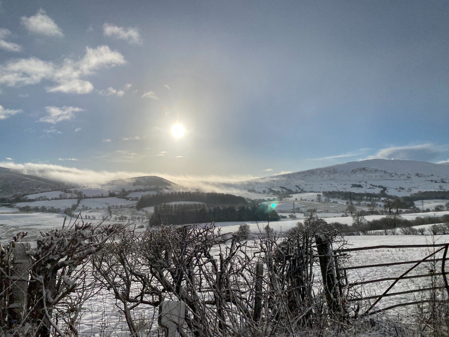 Snow-capped mountain peaks from a distance